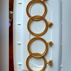 Golden hanging women bracelets